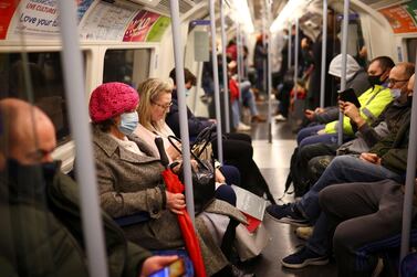 People ride a tube train as the spread of the coronavirus disease (COVID-19) continues, in London, Britain, December 15, 2020. REUTERS/Henry Nicholls