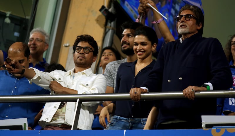 Late actor Irrfan Khan, left, Deepika Padukone, centre, and veteran star Amitabh Bachchan during the 2015 IPL match between Mumbai Indians and Kolkata Knight Riders at the Wankhede Stadium in Mumbai. Sportzpics / IPL