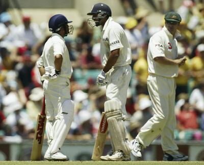 SYDNEY, AUSTRALIA - JANUARY 3:  Sachin Tendulkar and VVS Laxman of India chat after a near run out as Steve Waugh of Australia looks on during day two of the 4th Test between Australia and India at the SCG on January 3, 2004 in Sydney, Australia. (Photo by Hamish Blair/Getty Images)   