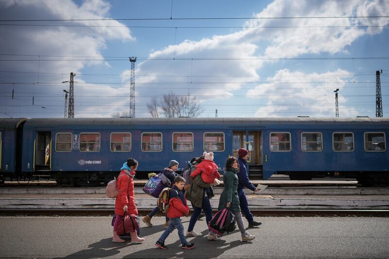 Fleeing refugees arrive at the border train station of Zahony, Hungary, in March 2022. Getty Images