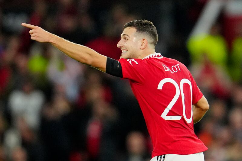 Diogo Dalot celebrates after scoring. AP