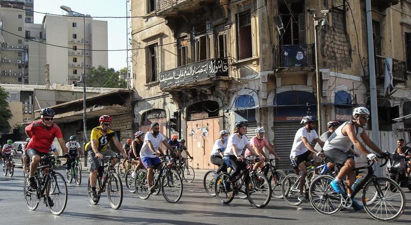 People take part in the 'Bike for Beirut' charity ride in Beirut.  EPA