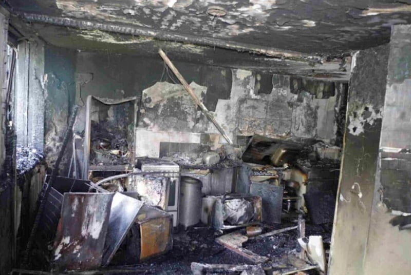 This is an undated handout photo issued by the Grenfell Tower Inquiry on Monday, June 4, 2018 of the kitchen in flat 16 where the fire started. An expert says residents of London's Grenfell Tower high-rise were wrongly told to stay in their apartments as fire raged through the building, aided by flammable external cladding that did not meet safety standards. . Fire-safety engineer Barbara Lane says the "stay put" policy had "effectively failed" barely a half-hour after the fire started early on June 14, 2017. (Grenfell Tower Inquiry via AP)