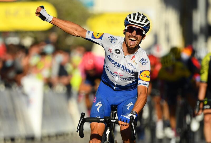 Deceuninck-Quick Step's French rider Julian Alaphilippe celebrates after winning Stage 2. Reuters