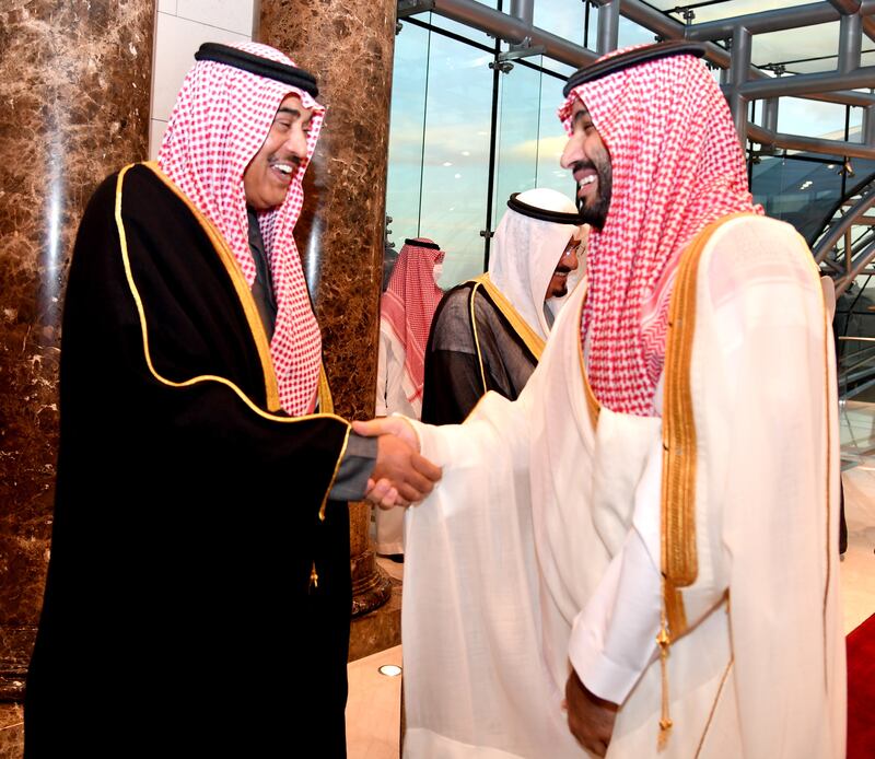 Saudi Crown Prince Mohammed bin Salman shakes hands with Kuwaiti Prime Minister Sheikh Sabah Khaled Al Sabah. EPA