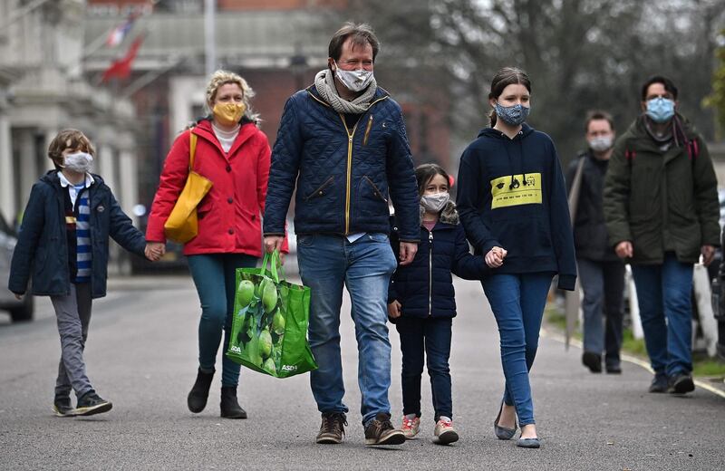 Richard Ratcliffe and his daughter Gabriella arrive to attend the protest. AFP