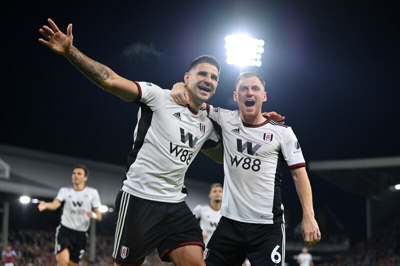Aleksandar Mitrovic of Fulham celebrates with teammate Harrison Reed after scoring their side's second goal. Getty Images
