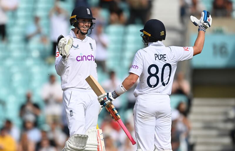 LONDON, ENGLAND - SEPTEMBER 12: England opening batsman Zak Crawley (l) and Ollie Pope celebrate the winning runs during day five of the Third LV= Insurance Test Match between England and South Africa at The Kia Oval on September 12, 2022 in London, England. (Photo by Gareth Copley / Getty Images)