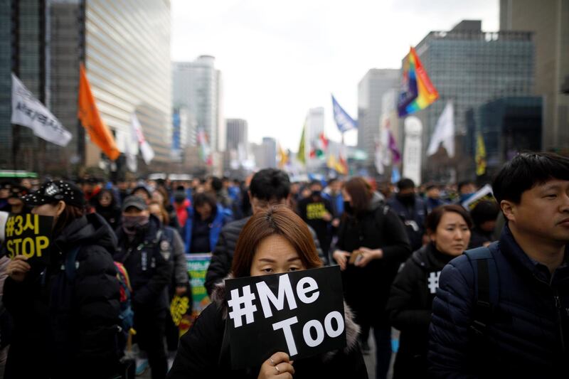 People attend a protest as a part of the #MeToo movement on the International Women's Day in Seoul, South Korea, March 8, 2018.   REUTERS/Kim Hong-Ji