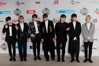 The agency for the South Korean band BTS has apologized for a member wearing a T-shirt depicting the explosion of an atomic bomb. Kin Cheung / AP photo