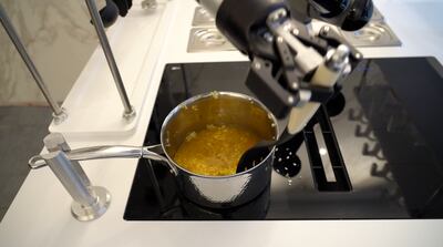 A robotic arm preparing a risotto at a London showroom. Photo: The National