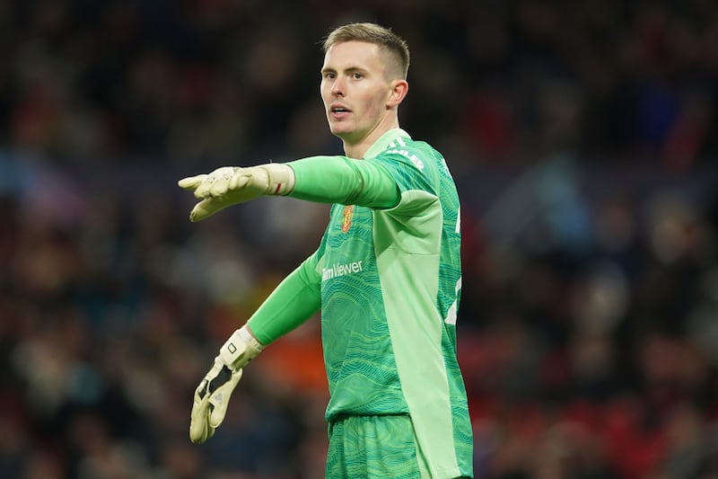 MAN UNITED RATINGS: Dean Henderson – 7. The first of eleven changes from Sunday’s Palace game and quick off his line to clear a 21st minute Young Boys attack. Decent save on a slippy, soaked, surface abut could do nothing for Rieder’s stunning 42nd minute equaliser. United haven’t kept a clean sheet at home for five Champions League matches. AP Photo
