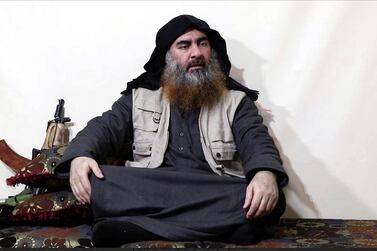 This image made from video posted on a militant website on Monday, April 29, 2019, purports to show the leader of the Islamic State group, Abu Bakr al-Baghdadi, being interviewed by his group's Al-Furqan media outlet. Al-Bagdadi acknowledged in his first video since June 2014 that IS lost the war in the eastern Syrian village of Baghouz that was captured last month by the Kurdish-led Syrian Democratic Forces. (Al-Furqan media via AP)