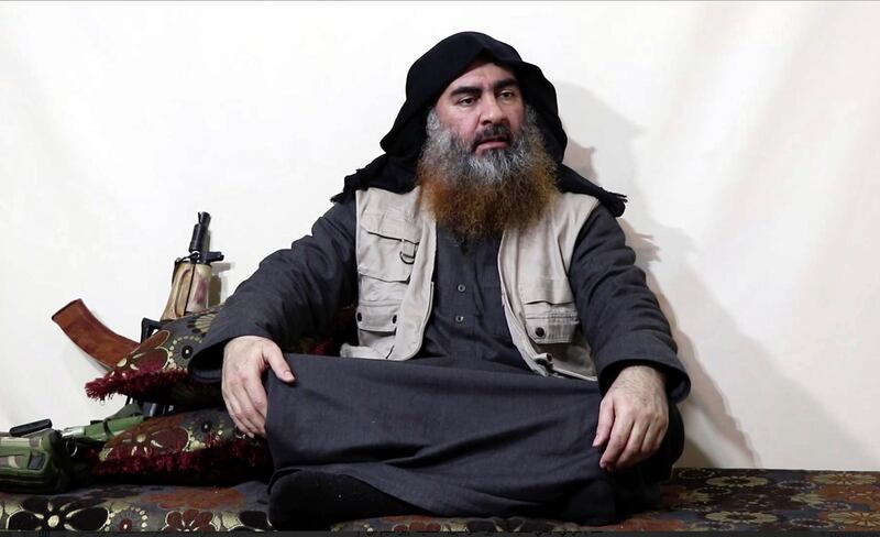 This image made from video posted on a militant website on Monday, April 29, 2019, purports to show the leader of the Islamic State group, Abu Bakr al-Baghdadi, being interviewed by his group's Al-Furqan media outlet. Al-Bagdadi acknowledged in his first video since June 2014 that IS lost the war in the eastern Syrian village of Baghouz that was captured last month by the Kurdish-led Syrian Democratic Forces. (Al-Furqan media via AP)