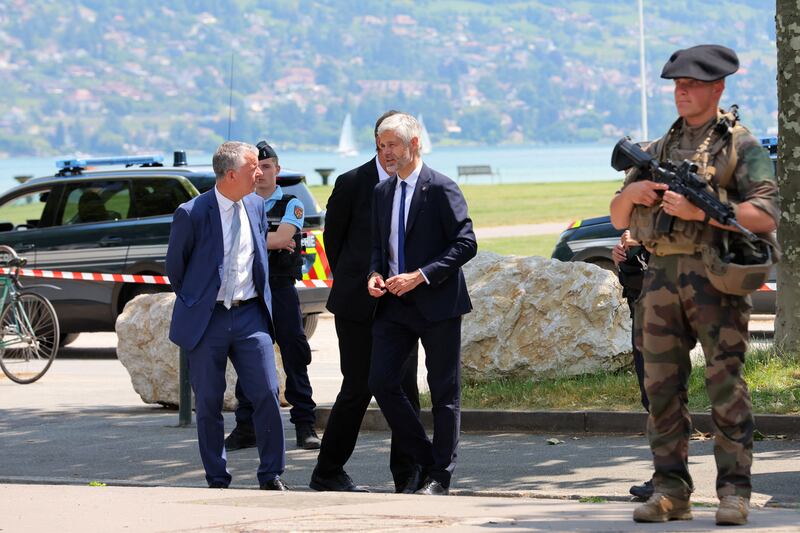 Mr Wauquiez, the regional council president, arrives at the scene. Reuters