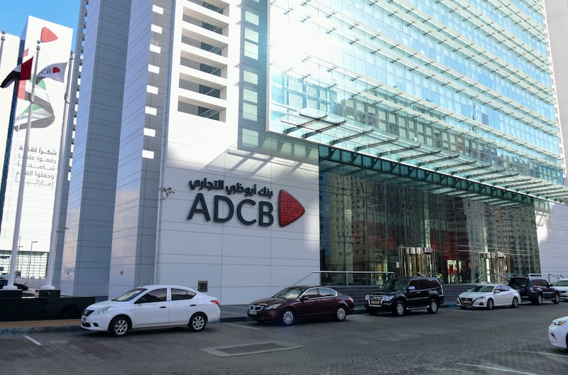 Abu Dhabi Commercial Bank's head office in Abu Dhabi. The lender recorded lower impairments during the fourth quarter. Khushnum Bhandari / The National