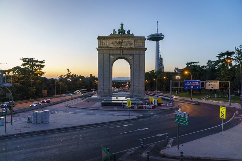 The Arco de la Victoria monument stands in Moncloa square as the sun sets in Madrid, Spain, on Wednesday, Oct. 7, 2020. France, Spain and the Czech Republic posted record increases in coronavirus cases, underscoring growing alarm in Europe as it struggles to control the pandemic. Photographer: Paul Hanna/Bloomberg