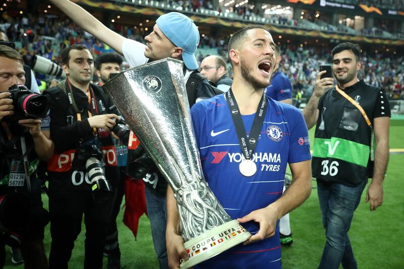 Eden Hazard celebrates with the Europa League trophy after Chelsea's 4-1 win over Arsenal. Getty