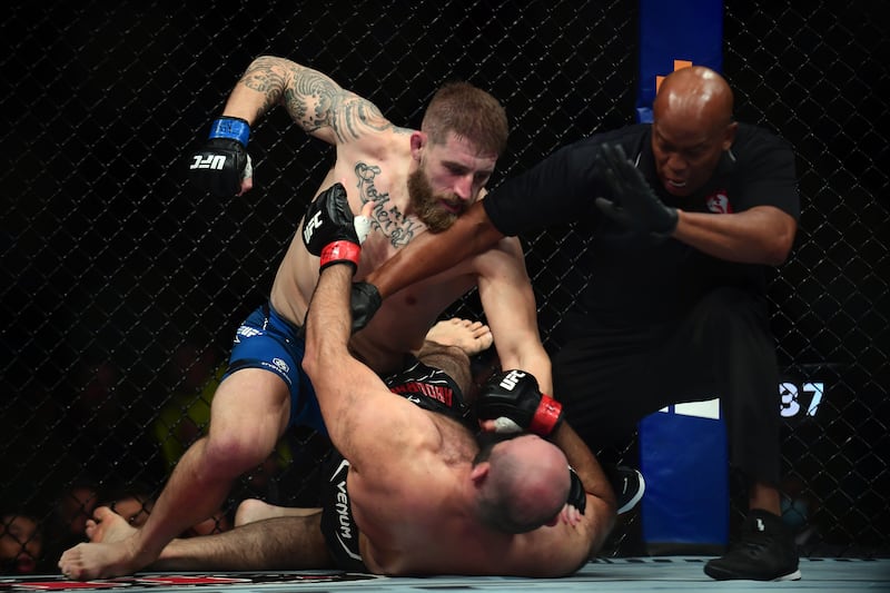 Chris Daukaus lands a hit against Shamil Abdurakhimov as the fight is stopped. Reuters