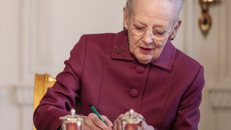 Denmark's Queen Margrethe II signed a declaration of abdication on Sunday, wearing the Ruby Horseshoe brooch. EPA