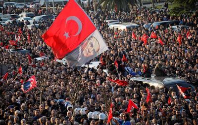 Supporters of main opposition Republican People's Party (CHP) gather outside the City Hall building in Istanbul, Turkey, April 17, 2019. REUTERS/Kemal Aslan
