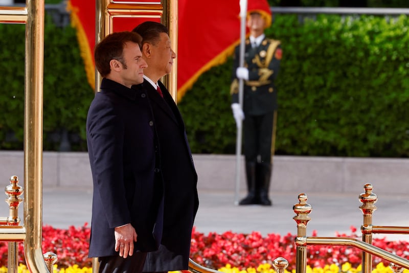 The two leaders on the podium at the Great Hall of the People in Beijing. Reuters