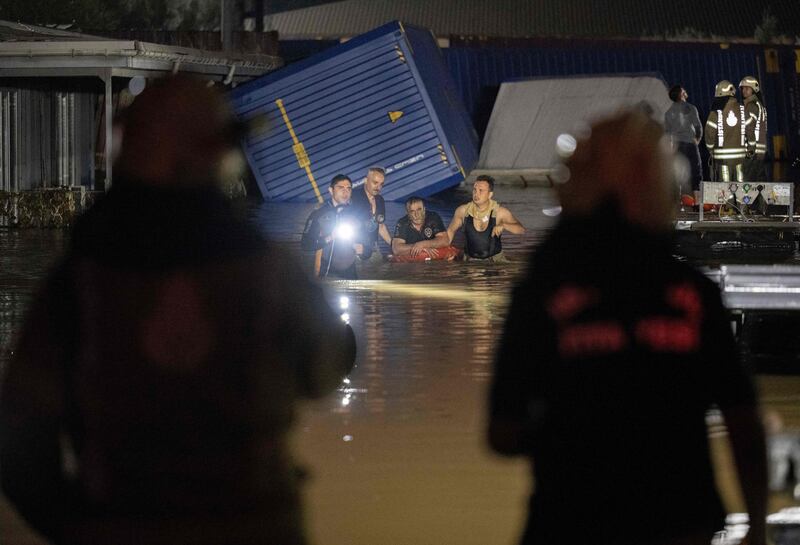 A man is rescued and evacuated during flooding of Kucukcekmece district in Istanbul.  AFP