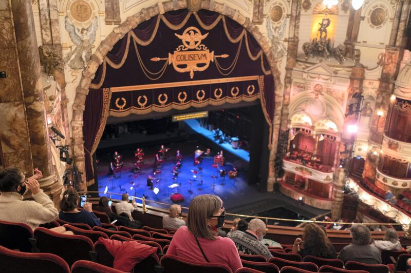 Before the latest announcement by Boris Johnson, about a second Coronavirus pandemic lockdown, opera-lovers await the start of a rehearsal of the first socially-distanced performance by English National Opera (ENO) in the London Coliseum which has remained closed throughout summer, on 24th October 2020, in London, England. Musicians and singers on stage are separated appropriate to government restrictions and audience members are seated with same household groups. The Marriage of Figaro was ENO's last show on 14th March, and the Coliseum has stayed closed until now. The UKs theatre ticket revenue contributes Â£1.28bn to the nations economy, in which there are 290,000 jobs (70% are at risk) so the government has announced a financial rescue package for the Arts industry, a Â£1.15bn support for cultural organisations in England that is made up of Â£880m in grants and Â£270m of repayable loans. The 2,395-seat Coliseum (1904) is a Baroque revival (Wrenaissance) style theatre, built as one of West End's largest and most luxurious variety theatres. (Photo by Richard Baker / In Pictures via Getty Images)