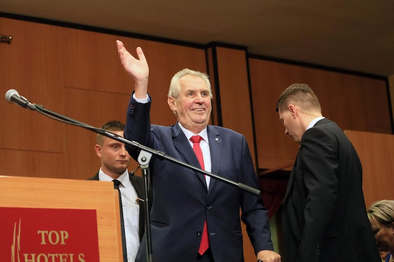 Pro-Russian incumbent Milos Zeman waves as he arrives to celebrate his victory with his staff members after he was reelected Czech President on January 27, 2018 at the Top hotel in Prague.
Zeman took 51.95 percent of the vote against 48.04 percent for Drahos with 96.87 percent of ballots counted, Czech Television reported quoting official results. / AFP PHOTO / RADEK MICA