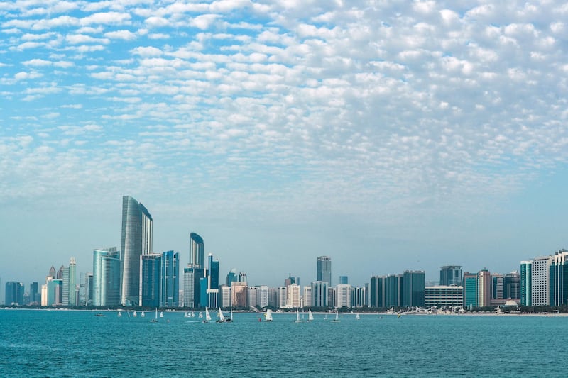 Abu Dhabi, United Arab Emirates, March 3, 2021.  Tiny cotton ball like clouds at the Corniche before sunset. Victor Besa / The NationalSection:  NAFor:  Big Picture/Stock Images/Standalones