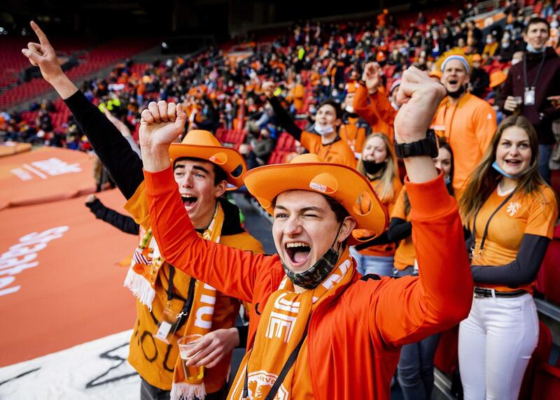 Dutch fans cheer during the match. EPA