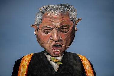 The Edenbridge Bonfire Society's 2019 "Celebrity Guy", Speaker of the House of Commons John Bercow, is erected after initially breaking during the unveiling on October 30, 2019 in Edenbridge, England; the 11 meter tall effigy, created by artist Andrea Deans, depicts Mr Bercow holding the heads of British Prime Minister Boris Johnson and Labour Party leader Jeremy Corbyn; it will be set on fire on November 2 as part of bonfire night celebrations Getty Images