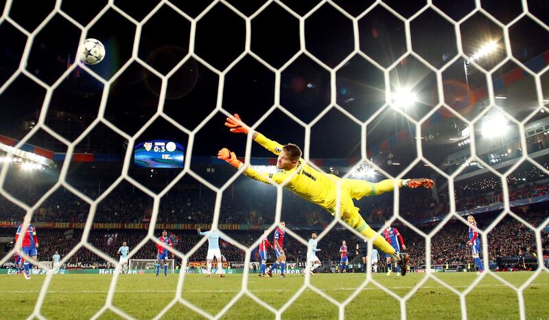 Soccer Football - Champions League - Basel vs Manchester City - St. Jakob-Park, Basel, Switzerland - February 13, 2018   Manchester City's Ilkay Gundogan scores their fourth goal                              Action Images via Reuters/Andrew Boyers     TPX IMAGES OF THE DAY