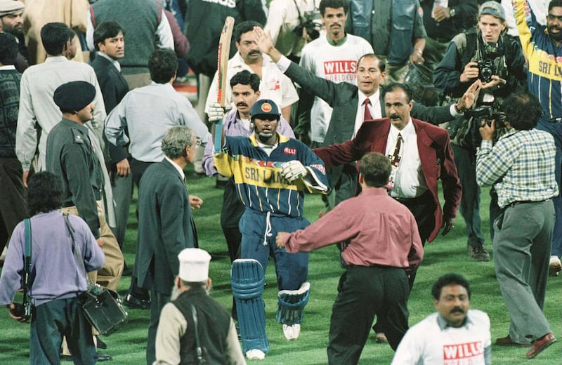 17 March 1996:  Aravinda De Silva raises his bat as he comes off the field after leading Sri Lanka to victory in the Cricket World Cup Final between Australia and Sri Lanka played at the Gaddafi stadium in Lahore. Mandatory Credit: John Parkin/ALLSPORT/Getty Images