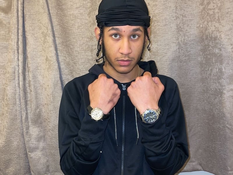 Roshan Clark wearing watches stolen in west London robberies. Photo: Met Police
