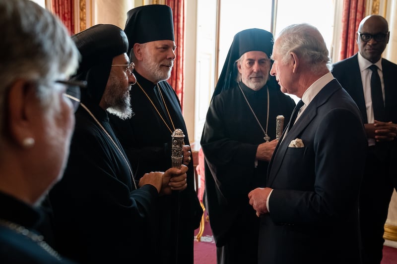 King Charles meets faith leaders during a reception at Buckingham Palace. Getty Images