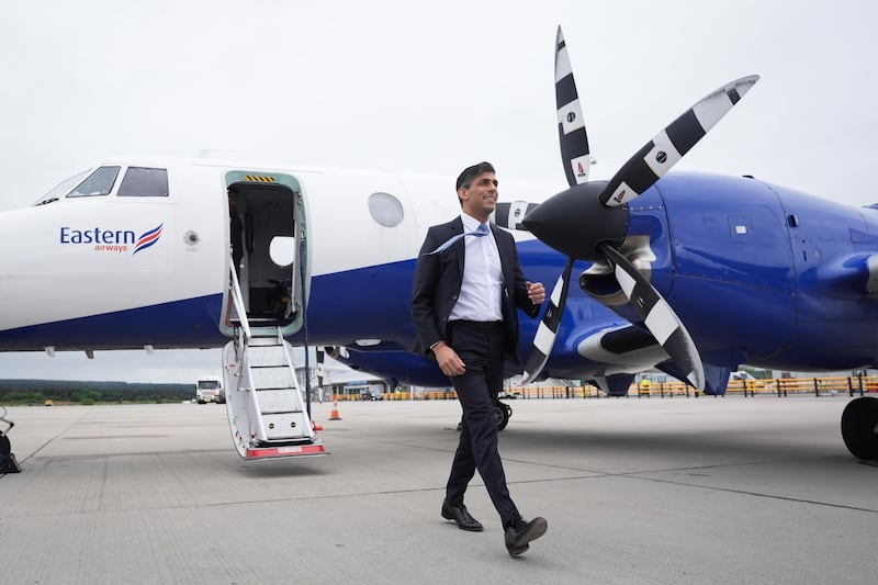 Mr Sunak arrives at Inverness Airport, in Scotland, on the general election campaign trail. PA