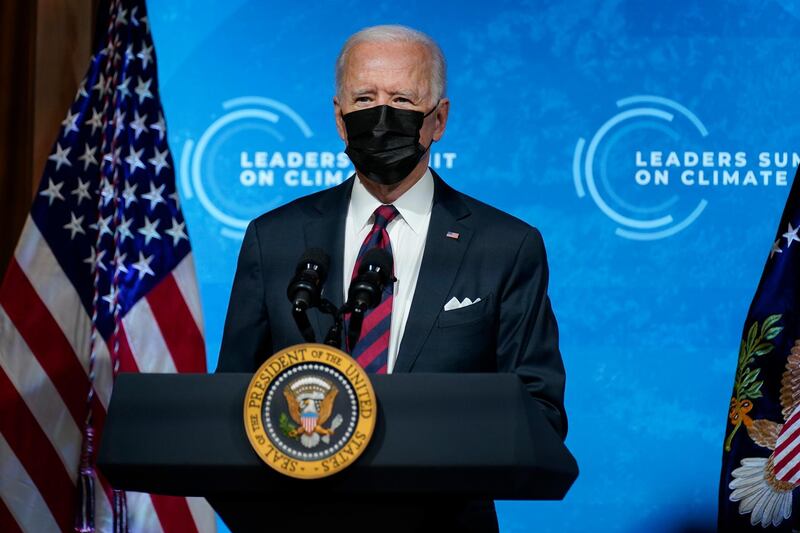 US President Joe Biden speaks to the virtual Leaders Summit on Climate, from the East Room of the White House in Washington, DC.  AP Photo