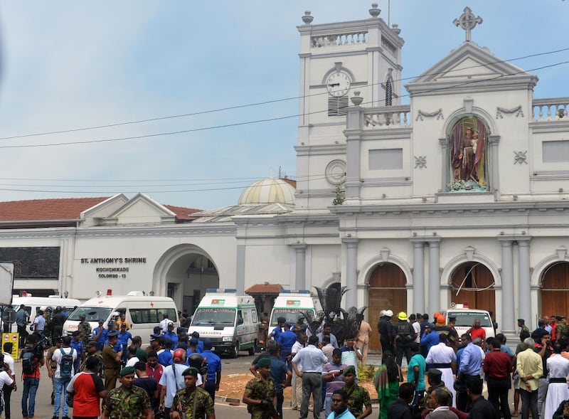 Ambulances are seen outside the church premises after a blast at the St Anthony's Shrine in Kochchikade, Colombo. AFP