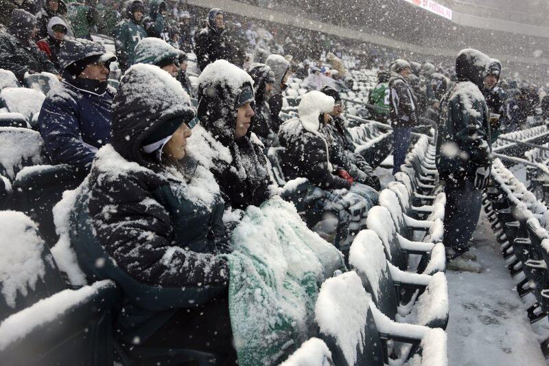 Fans in Philadelphia, Pennsylvania battle the cold on Sunday. Matt Rourke / AP