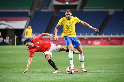 Egypt's forward Salah Mohsen (L) vies for the ball with Brazil's defender Diego Carlos during the Tokyo 2020 Olympic Games men's quarter-final football match between Brazil and Egypt at Saitama Stadium in Saitama on July 31, 2021. AFP