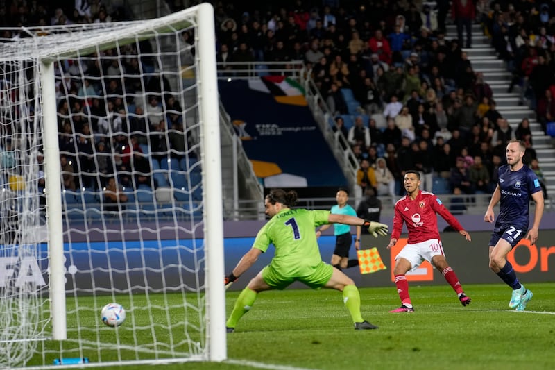 Auckland City goalkeeper Conor Tracey watches a shot from Al Ahly's Mohamed Sherif hit the post. AP