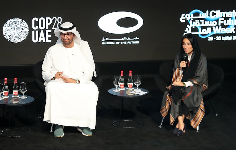 Dr Sultan Al Jaber, Cop28 President-designate and UAE Special Envoy for Climate Change, shares the stage with Razan Al Mubarak, UN Climate Change High-Level Champion for Cop28, at a conference in Dubai in the lead-up to the summit. Pawan Singh / The National
