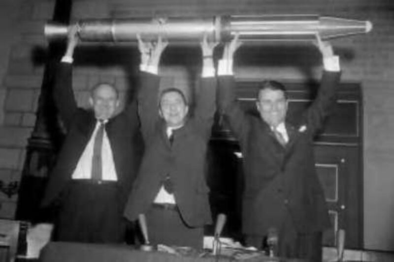 WASHINGTON DC, USA, February 1, 1958: (Left-right) Scientists Dr. William Pickering, Dr. James Van Allen and Dr. Wernher Von Braun celebrate the successful launching of the first U.S. satellite at the National Academy of Science.  They hold a model of the satellite called "Explorer" over their heads following the announcement made at Cape Canaveral, Florida. Bettmann/CORBIS

REF rv27space 27/06/08