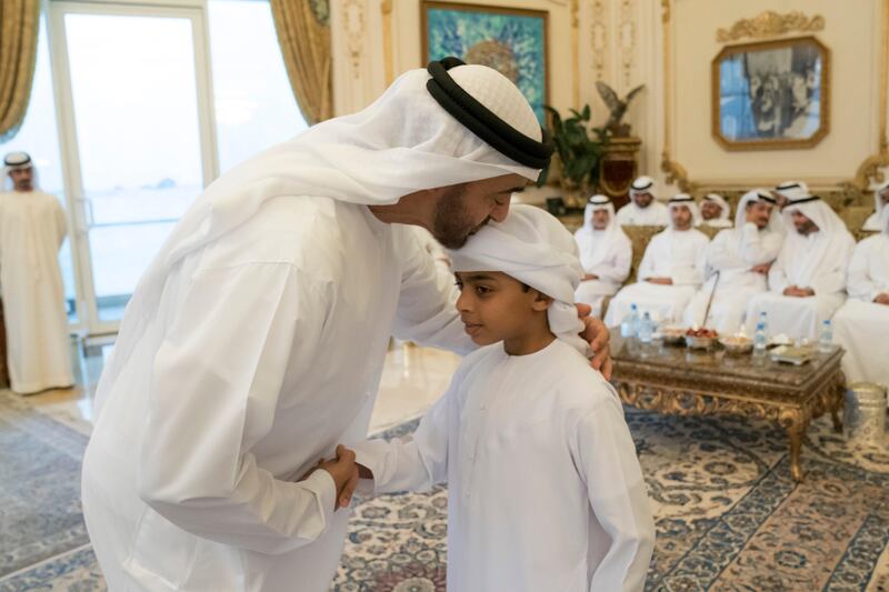 ABU DHABI, UNITED ARAB EMIRATES - October 09, 2017: HH Sheikh Mohamed bin Zayed Al Nahyan, Crown Prince of Abu Dhabi and Deputy Supreme Commander of the UAE Armed Forces (L) receives martyrs' children, who have excelled in school, during a Sea Palace barza. 

( Hamad Al Kaabi / Crown Prince Court - Abu Dhabi )
—