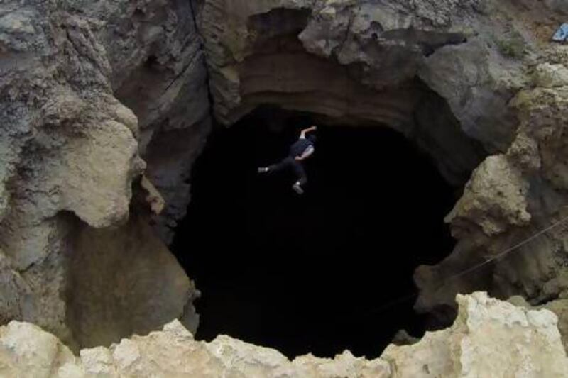 Cave jumpers take part in a jump into Majilis Al Jin in Oman, one of the world's largest indoor cave chambers. Courtesy of Noah Bahnson, SkyDive Dubai