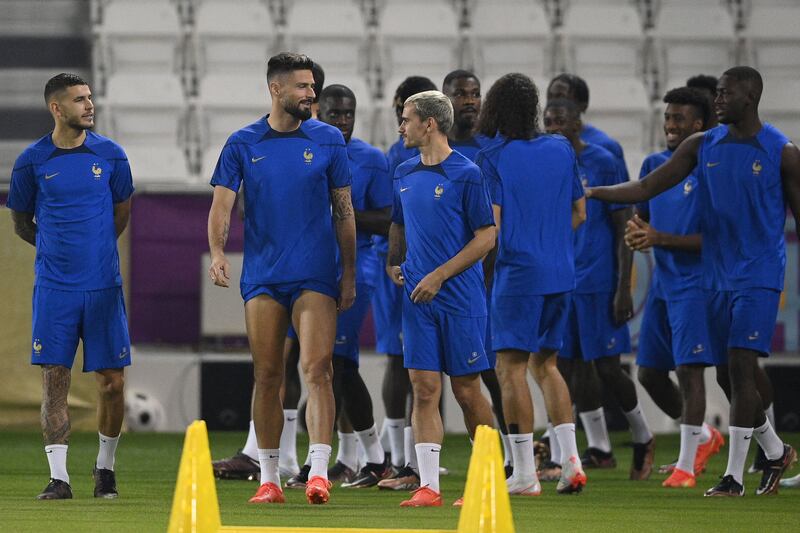 Olivier Giroud and Antoine Griezmann take part in a training session at Al Janoub Stadium. AFP