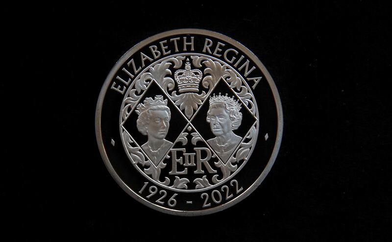 The head of Queen Elizabeth is on the back of the £5 coin. Reuters