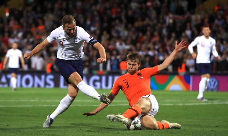 England's Harry Kane has a shot blocked by Netherlands' Matthijs de Ligt. PA Images