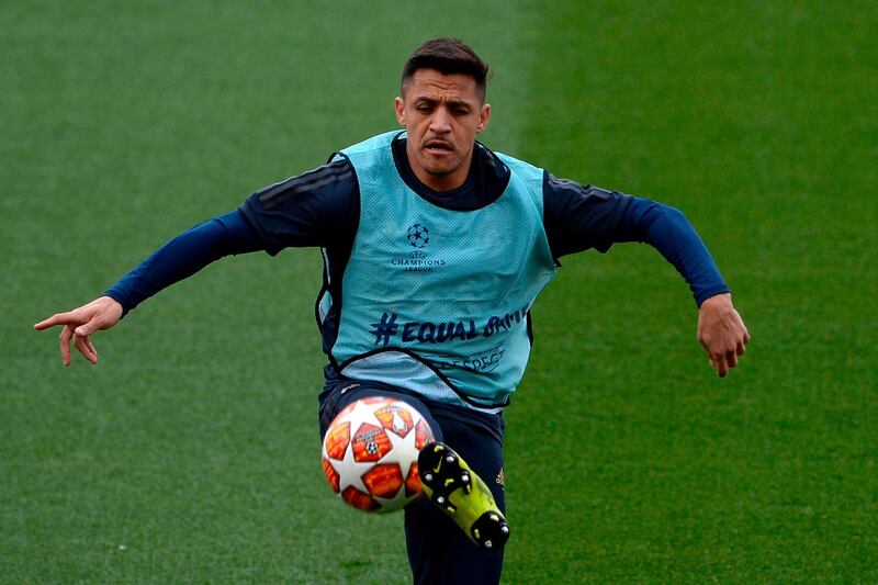 Alexis Sanchez trains ahead of the game. AFP